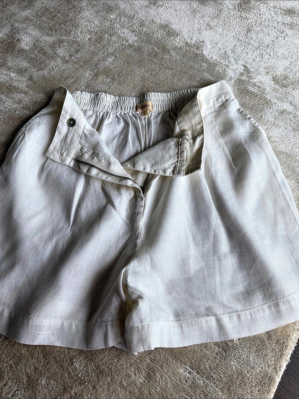 DONNI. The Linen Pleated Short. White High-Waist Shorts